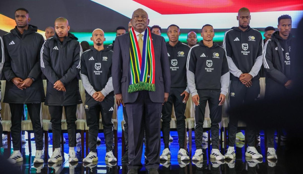 Cyril Ramaphosa with Bafana behind him